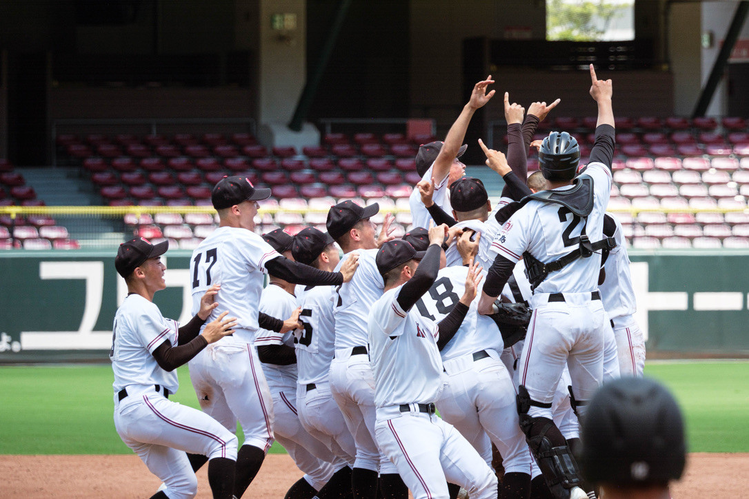 Baseball players celebrating together on the field